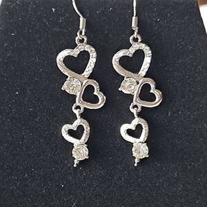 6 pair silvertone heart earrings Nwt
